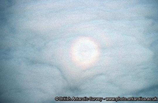 Atmospheric effects on the clouds seen from an aircraft flying above them.