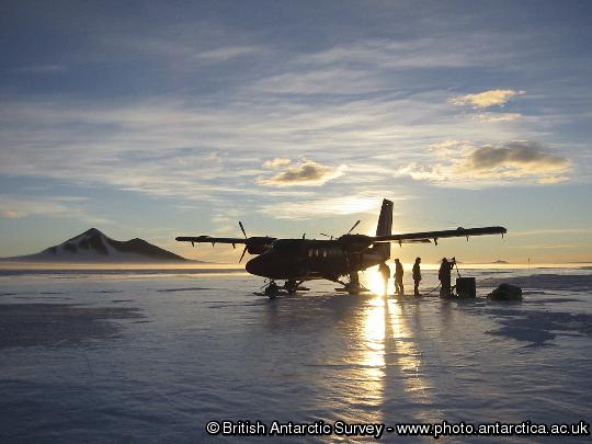 BAS Twin otter Aircraft refuels at Sky Blu runway under the midnight sun
