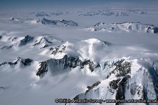 Mountains and glaciers of the Antarctic Peninsula from the air.