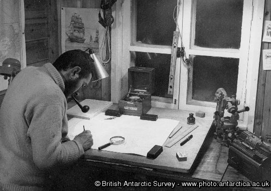 Wally Herbert at work on map in survey office at Hope Bay Station, Trinity Peninsula, Antarctica
