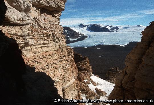 Weathered sandstone cliff in gully at Battleship Promontory, Dry valleys, Victoria Land