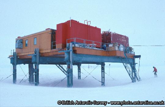 Scientist approaches the  Piggott Space Sciences Building at Halley research station (UK).
This image is associated with the 2005-2010 BAS science programme:  SEC - Sun Earth Connections.