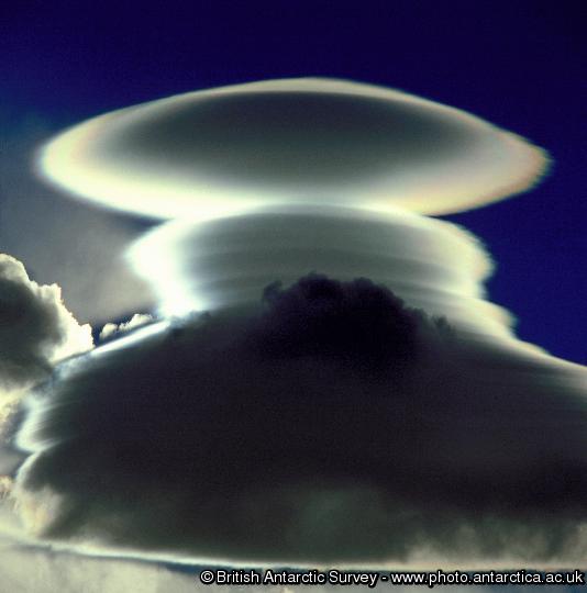 Lenticular clouds at South Georgia, indicating lee-wave generation within the atmosphere. The waves are caused by stratified air flowing over the island. Taken from Barff Peninsula, South Georgia.