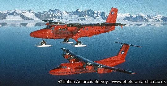 British Antarctic Survey ski-equiped Twin Otter and Dash-7 aircraft  above Rothera research station, Adelaide Island, Antarctica.