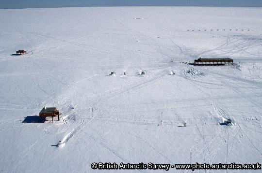 Aerial view of the Halley Research station showing the three platforms. The Simpson building is in the foreground.
