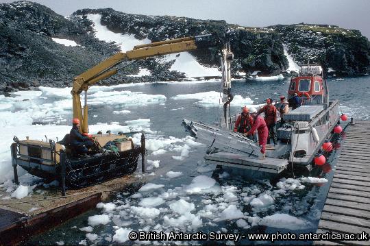 Unloading Building Materials on the jetty of Signy Research Station.