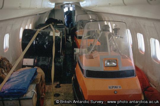 Field party cargo and empty fuel drums being returned from Sky Blu The Dash 7 aircraft can be configured without passenger seats, allowing transport of complete field units, including skidoos, in addition to the removal of waste fuel drums etc from Sky Blu.