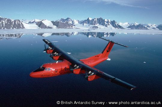 BAS Dash 7 over the mountains of the Antarctic Peninsula close to Rothera Research Station.
