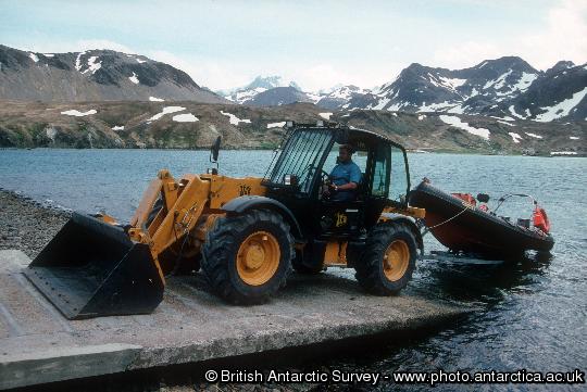 Recovering the fast rescue craft at King Edward Point , KEP, Research Station, South Georgia