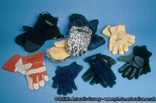 Antarctic Clothing Pictures Gloves / Mitts.Upper: Std mitts, Bearpaw Mitts, insulated work ves. Lower: work Gloves, Liner Gloves , Leather/fleece Field Glove, Windproof liner Glove.