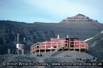 A meterological  observation being taken at the Stevenson's screen at Fossil Bluff, Alexander Island