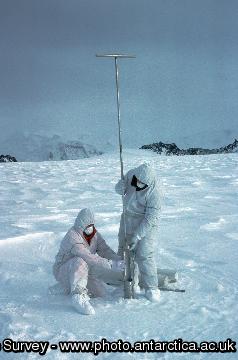 Scientists use a hand drill to take 10 metre ice cores