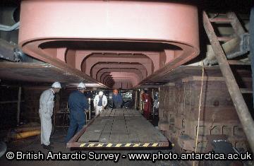 One of the transducer units being fitted in the hull of the ship