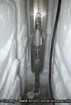 Ice core drilling operations at a Berkner Island drilling site.
Scientists have succeeded in drilling 1000 metre-deep ice core and reached bedrock. The core gives a continuous record of the climate on Berkner spanning the past 30,000 years. This period is particularly interesting as it includes the dramatic tranition from the last ice age into the current Holocene warm period, when the average temperature of the Antarctic rose by 8C. Situated at the southern end of the Atlantic Ocean, the Berkner Island coast will give a clear view of the southern response to changes in ocean currents that are believed to have occurred during this period.
This image is associated with the 2005-2010 BAS science programme: CACHE- Climate and Chemistry: Forcings, Feedbacks and Phasings in the Earth System.