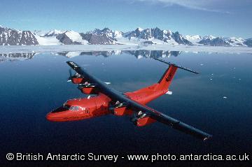 BAS Dash 7 over the mountains of the Antarctic Peninsula close to Rothera Research Station.
