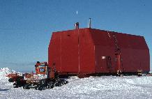 Garage on skis - external. The garage is built on skis and is moved to a new location each year to prevent it becoming buried in snow.