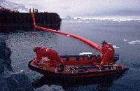 An oil spill defence boom being deployed during an exercise at Rothera Research Station